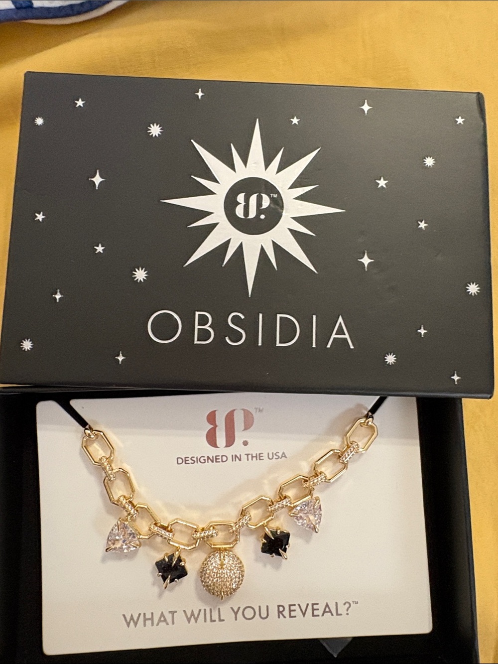 Obsidia Gold-Tone Link Necklace with Black and Clear Charms
